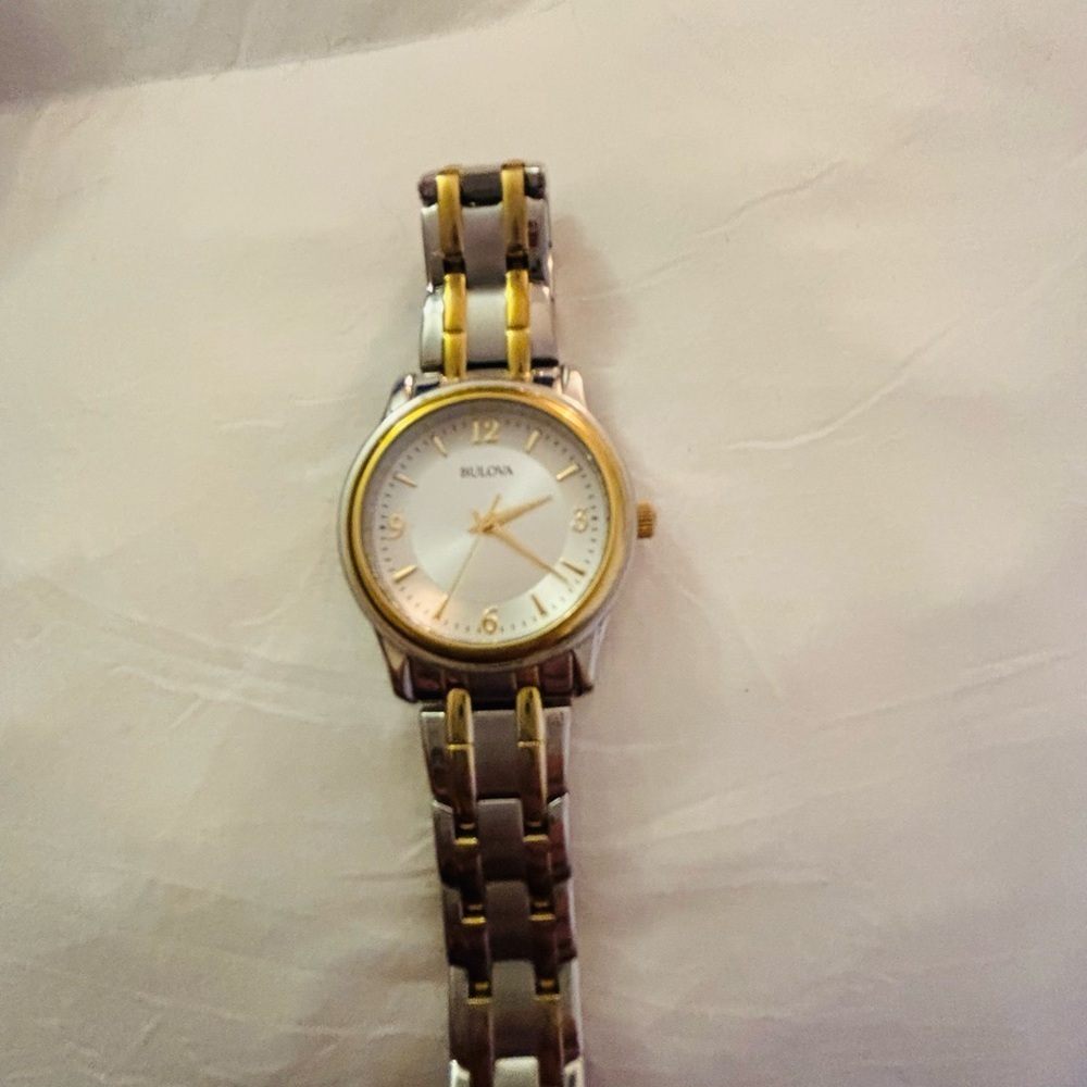 Bulova Gold And Silver Watch With White Dial